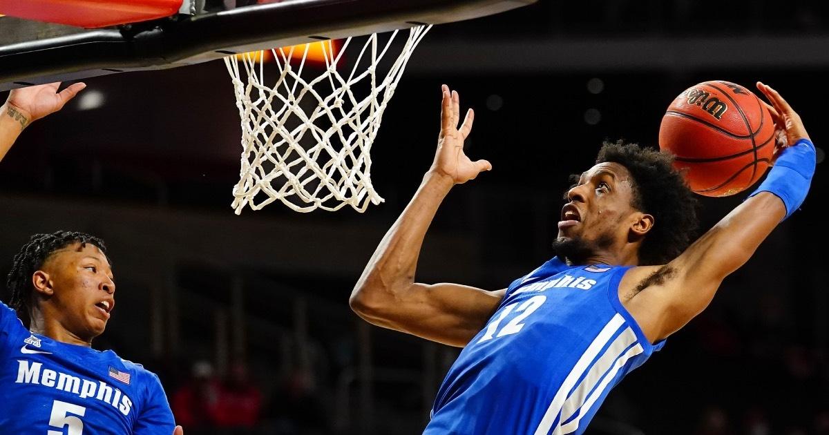 Memphis' Deandre Williams grabs a rebound against Cincinnati.