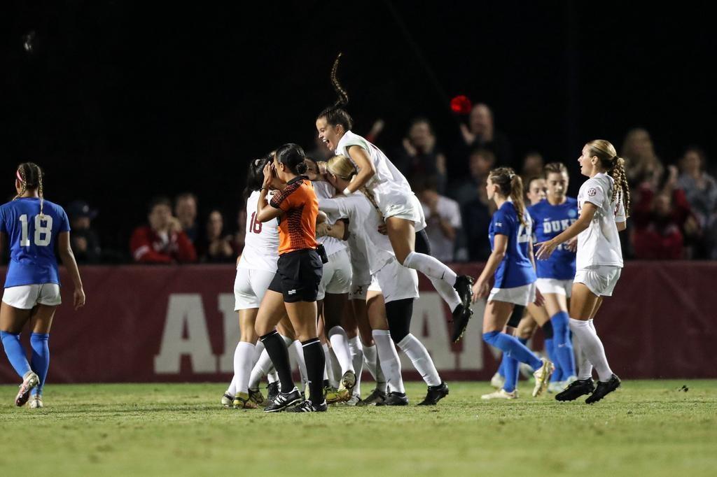 Alabama women's soccer celebrating goal vs. Duke