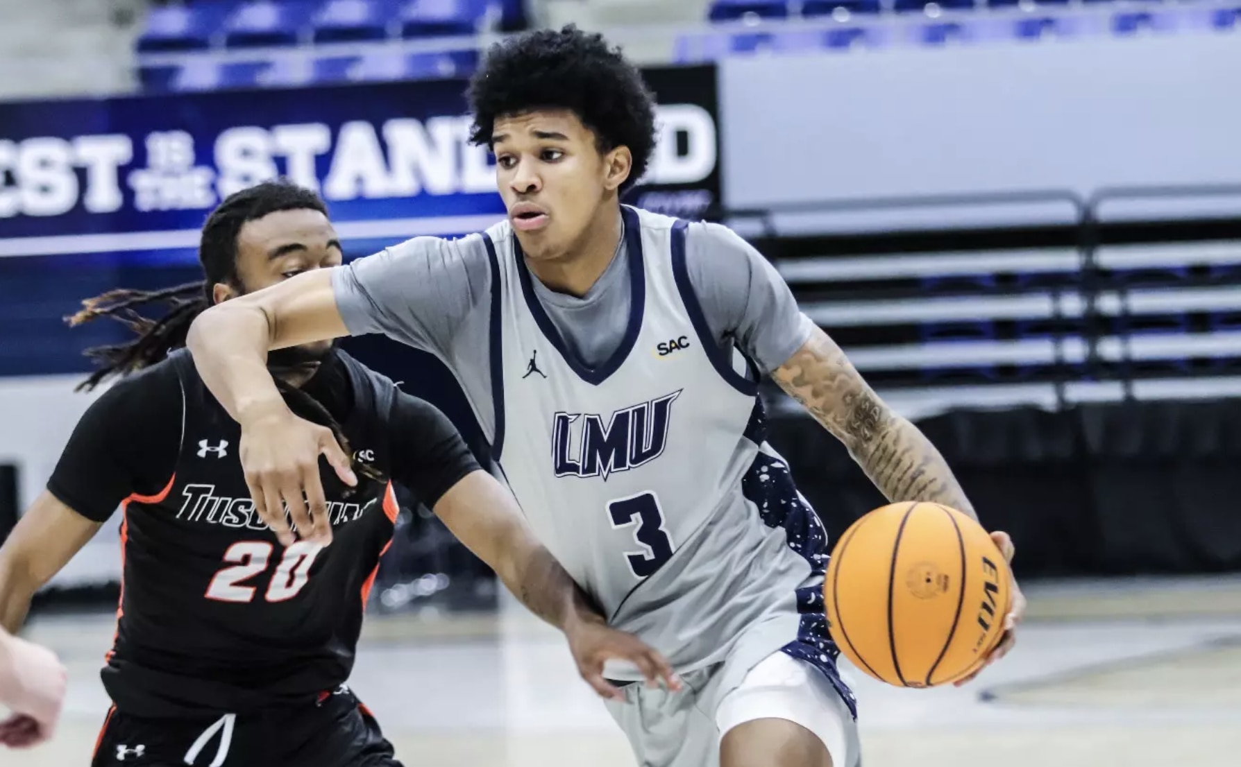 Elyjah Freeman drives to the hole in DII men's basketball.