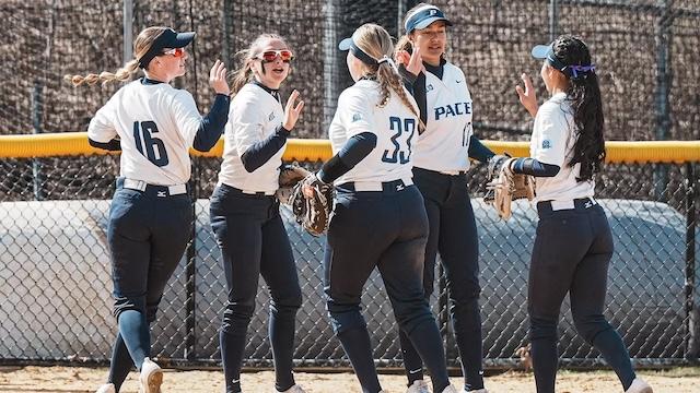 Pace softball is all high fives after another win.
