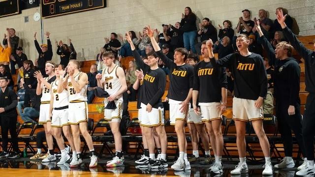 Michigan Tech celebrates making the DII men's basketball championship.